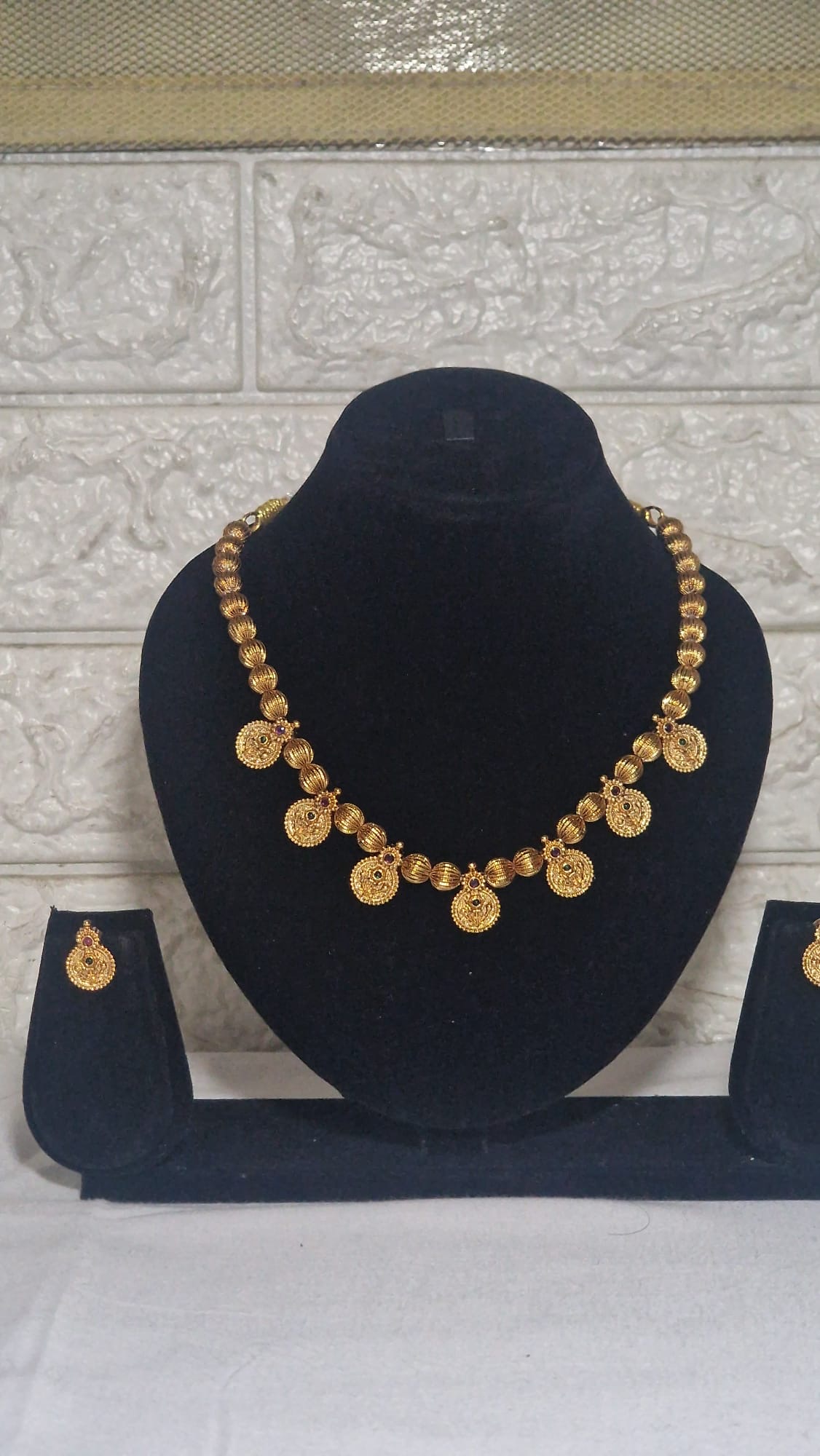 Coin-drop necklace