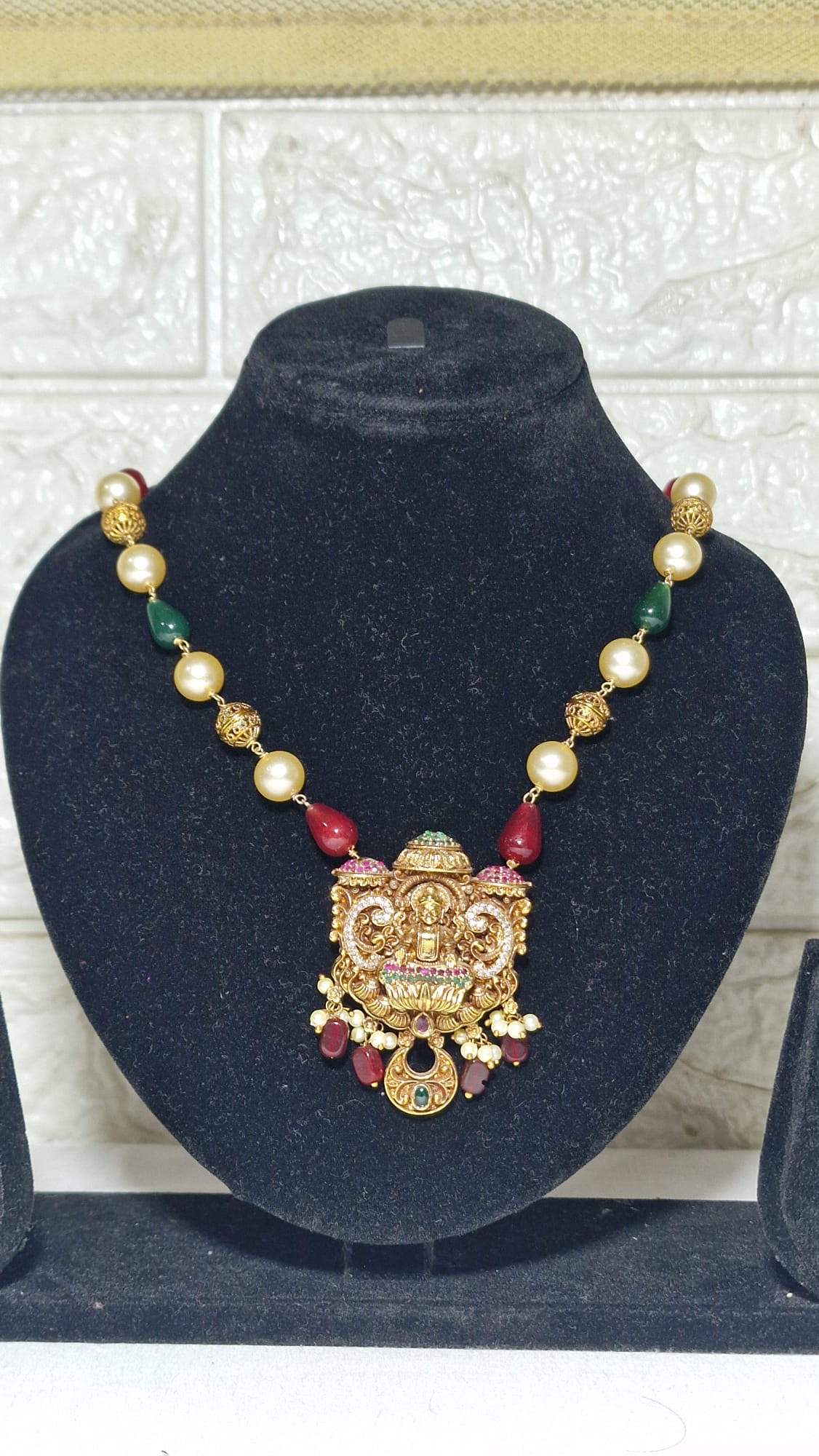 Beaded deity pendant necklace